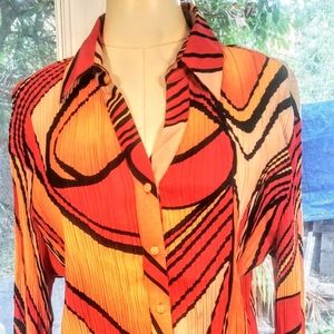 Psychedelic 70's looking orange and red blouse.
